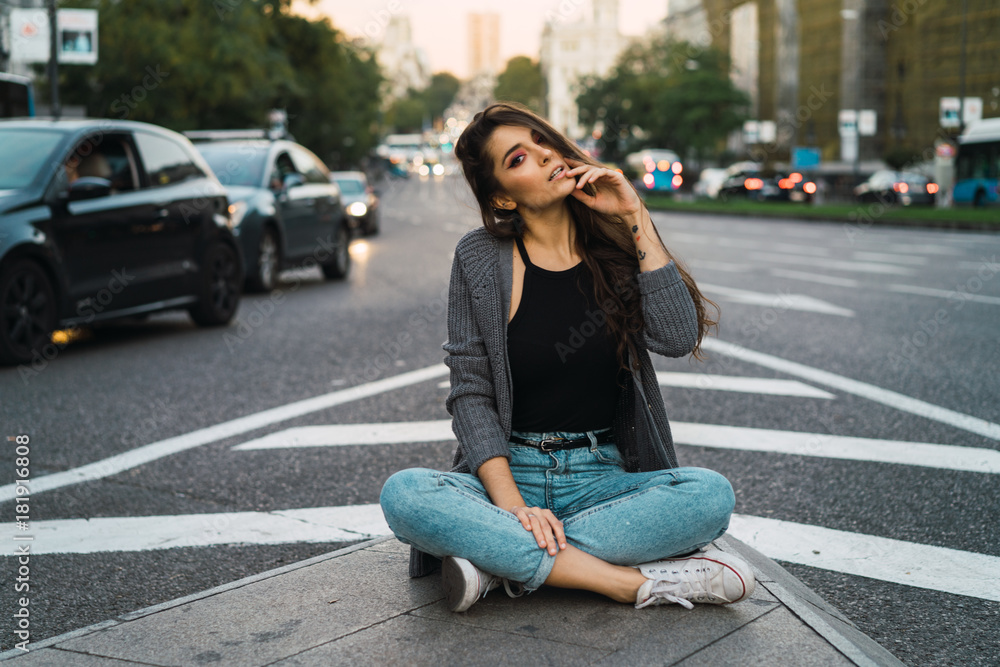 Stylish model on urban road Stylish model on urban road