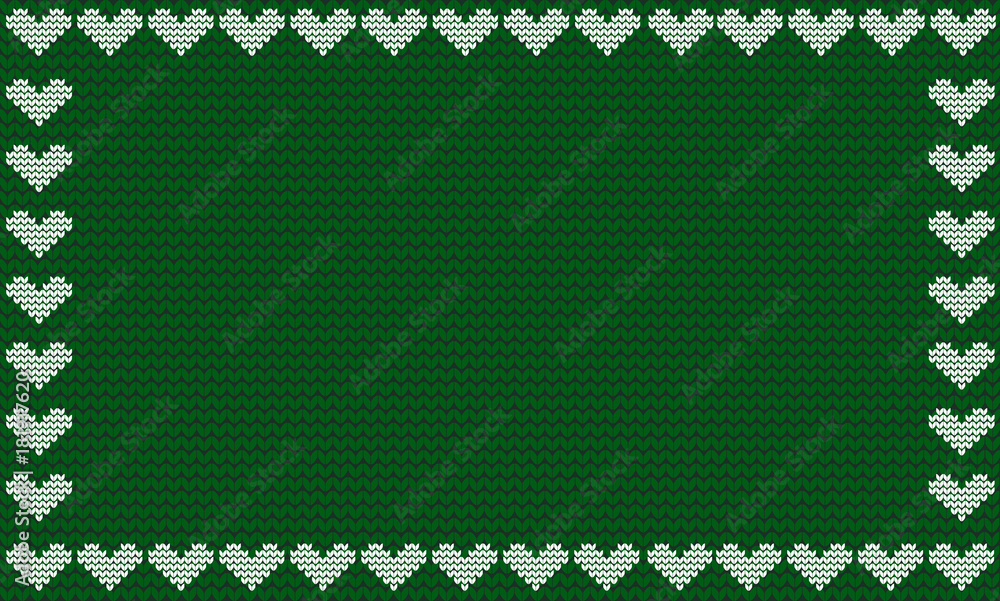 Emerald green fabric knitted background framed with knit white hearts Emerald green fabric knitted background framed with knit white hearts