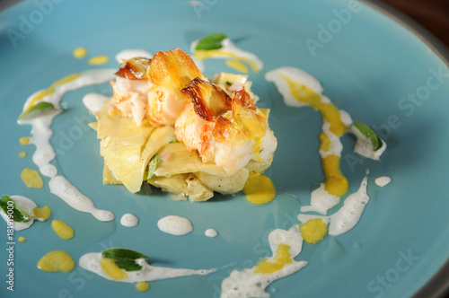 Grilled lobster meat on artichoke