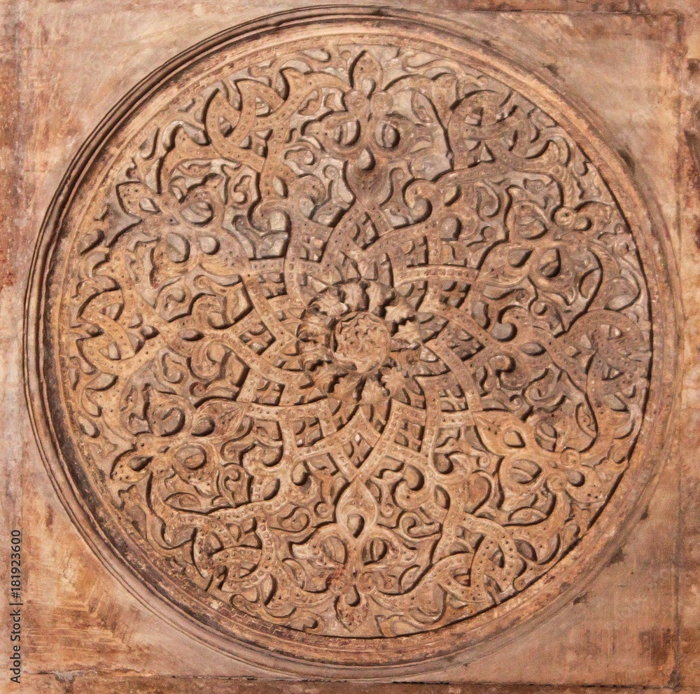 Arabian Oriental Ornamental carvings / An Islamic art of Arabian Oriental decorative ornamental carvings on a wall Arabian Oriental Ornamental carvings / An Islamic art of Arabian Oriental decorative ornamental carvings on a wall