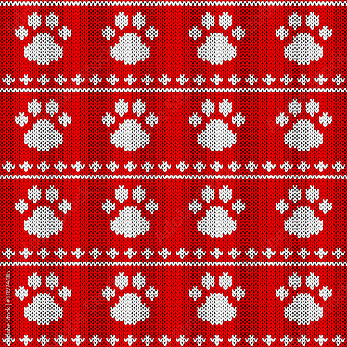 Abstract knitted dog paw seamless pattern background. Knit texture for design new year card, christmas invitation, holiday wrapping paper, winter vacation travel and ski resort advertising etc.