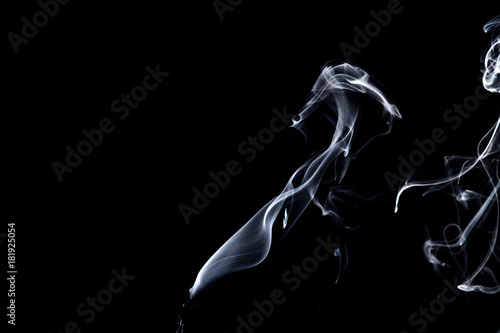 Abstract, white smoke isolated on black background. Isolate