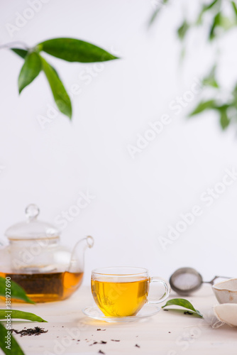 Cups of tea on wooden table background
