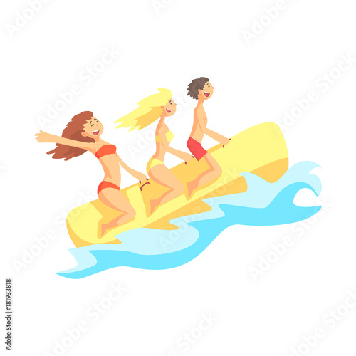 Happy three friends have fun on inflatable rubber yellow banana boat