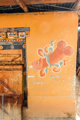 Obraz na plátne Bhutanese house with traditional phallus paintings near Punakha, Bhutan