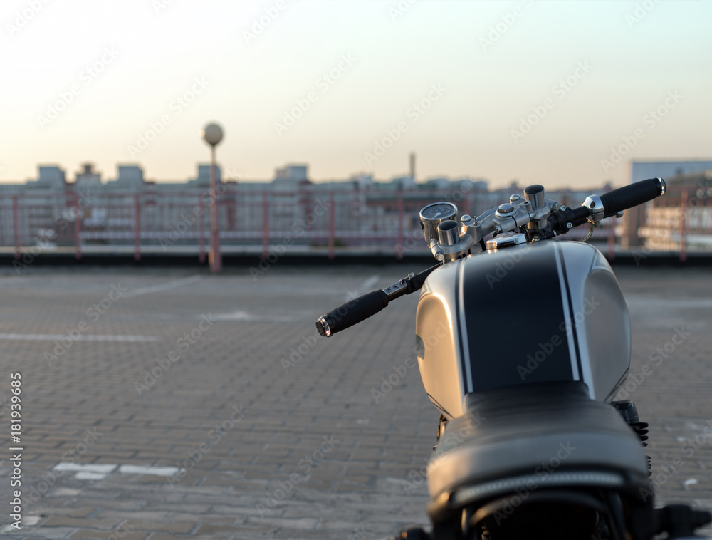 Naklejka premium Vintage custom motorcycle on parking