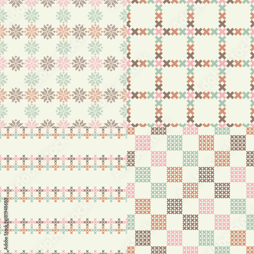 Set of 4 Seamless vector backgrounds cross stitch Norwegian snowflakes. Folk motifs. Winter pattern. Textile rapport.