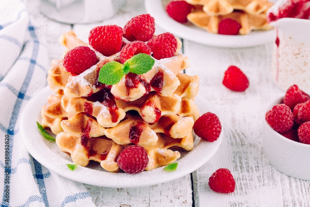 Homemade waffles with fresh raspberries for breakfast Homemade waffles with fresh raspberries for breakfast