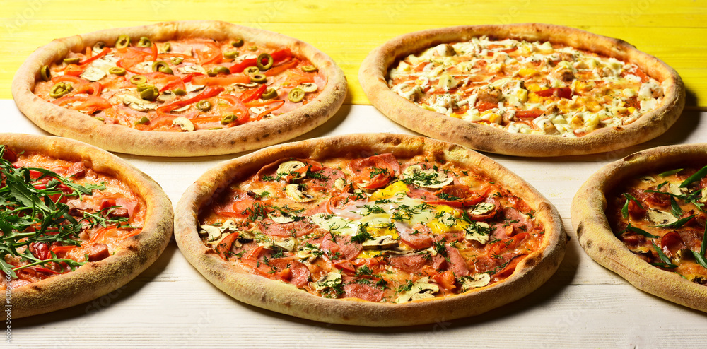 Italian pizza and pizzeria. Take away food with various ingredients Italian pizza and pizzeria. Take away food with various ingredients
