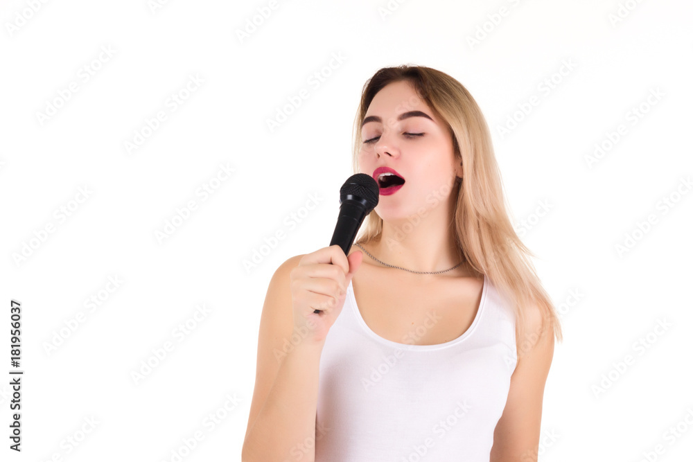 Young cute girl with microphone, isolated Young cute girl with microphone, isolated