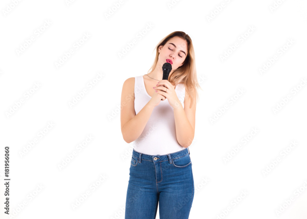 Young cute girl with microphone, isolated Young cute girl with microphone, isolated