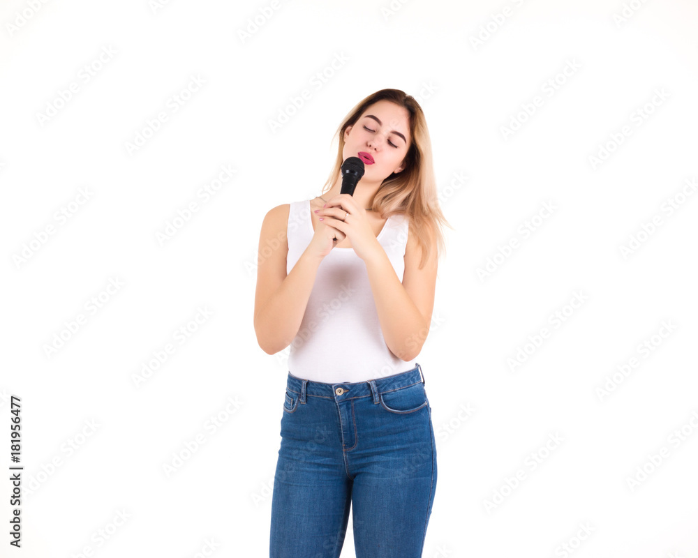 Young cute girl with microphone, isolated Young cute girl with microphone, isolated