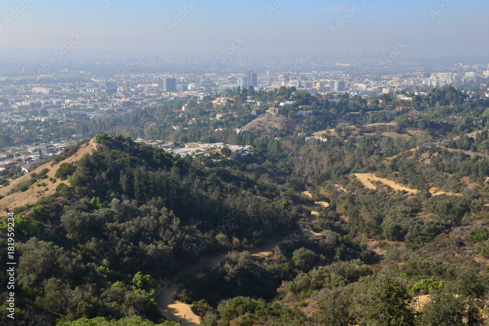 The Hollywood Hills overlooking a misty Los Angeles in the early morning
