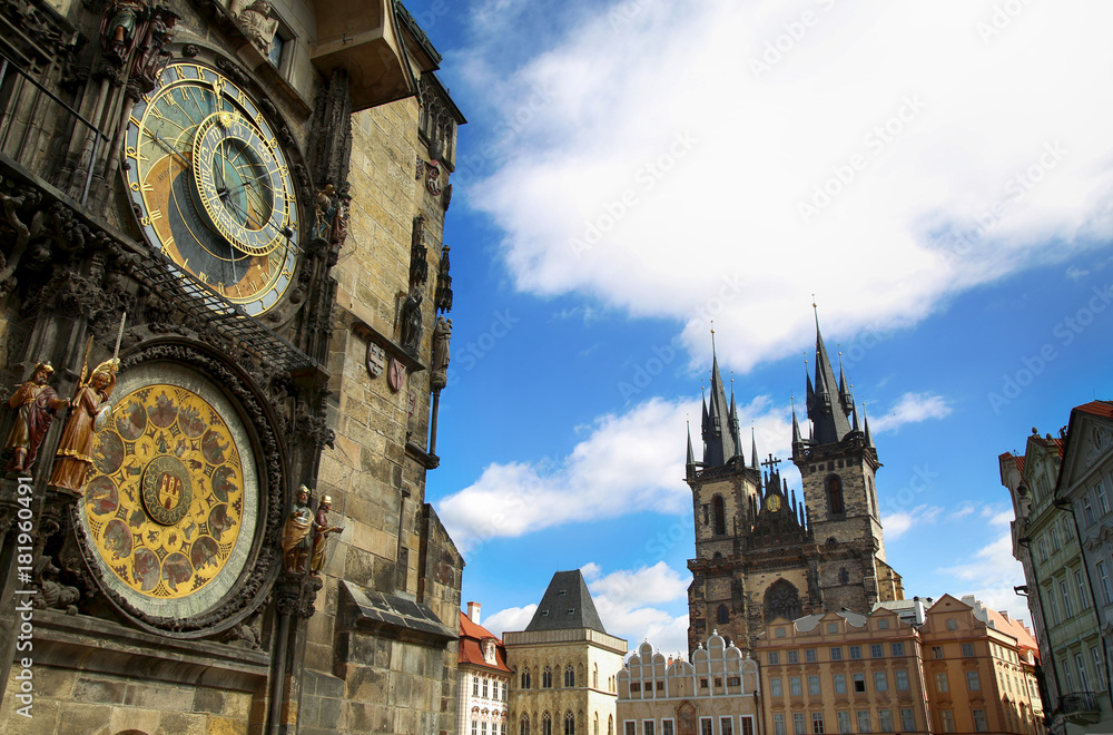 Obraz premium Famous Astronomical Clock Orloj and Church of our Lady Tyn in Prague, Czech Republic