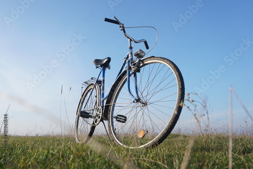 bike standing in the meadow © taraskobryn