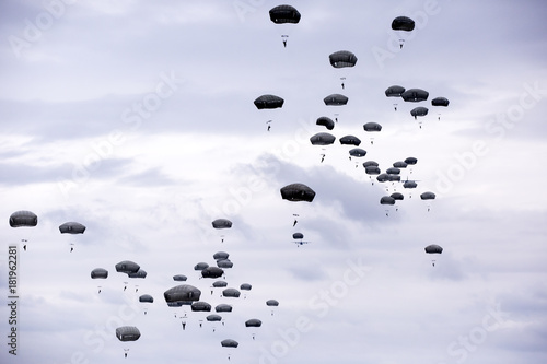 lots of parachutists in the sky