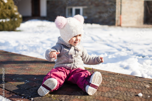 Fototapeta Naklejka Na Ścianę i Meble -  Winter walking of baby