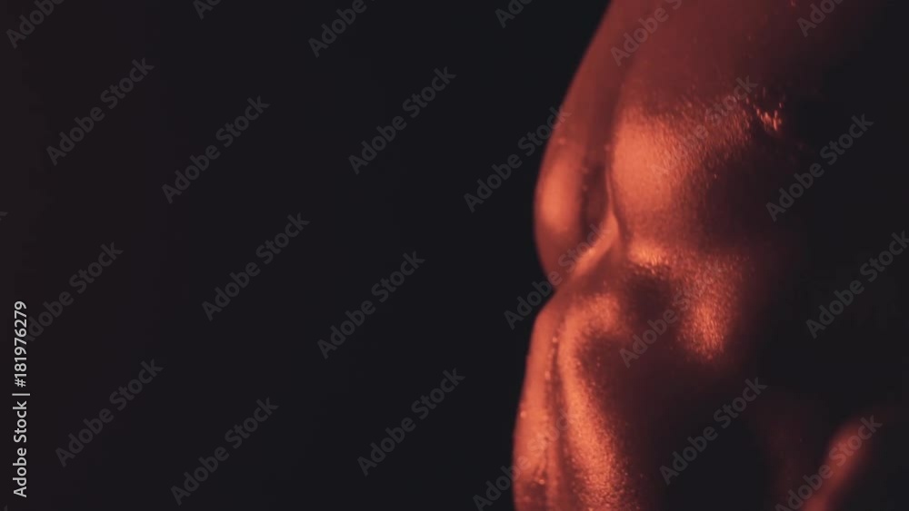 Man in chains in red smoke background Man in chains in red smoke background