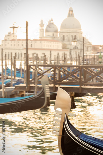 Gondola's prow in venetian lagoon.