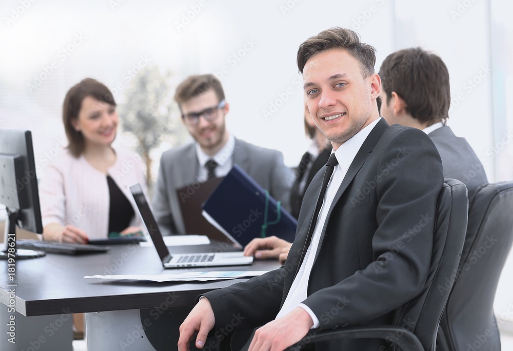 business team with a senior Manager in the foreground