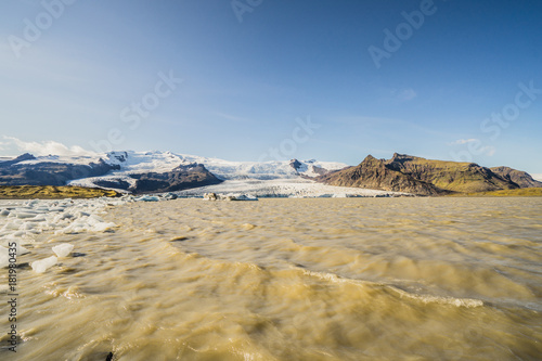 Icebergs floating in Fjallsarlon glacier lagoon, Iceland