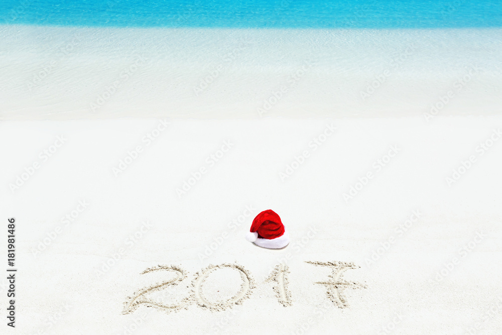 2017 inscription written on sandy beach 2017 inscription written on sandy beach