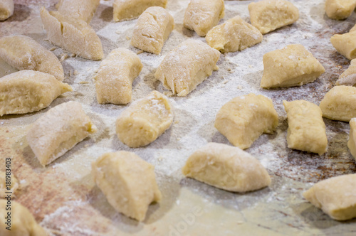 Raw kopytka or kapytki. Polish traditional potato dumpling.