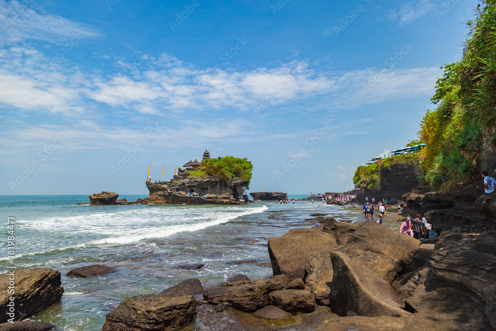 NOVEMBER 8, 2017 - BALI, INDONESIA: Tourists visited Tanah Lot water temple, one of the famous landscape in Bali.