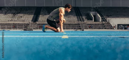 Obraz Sprinter na śladach na bieżni