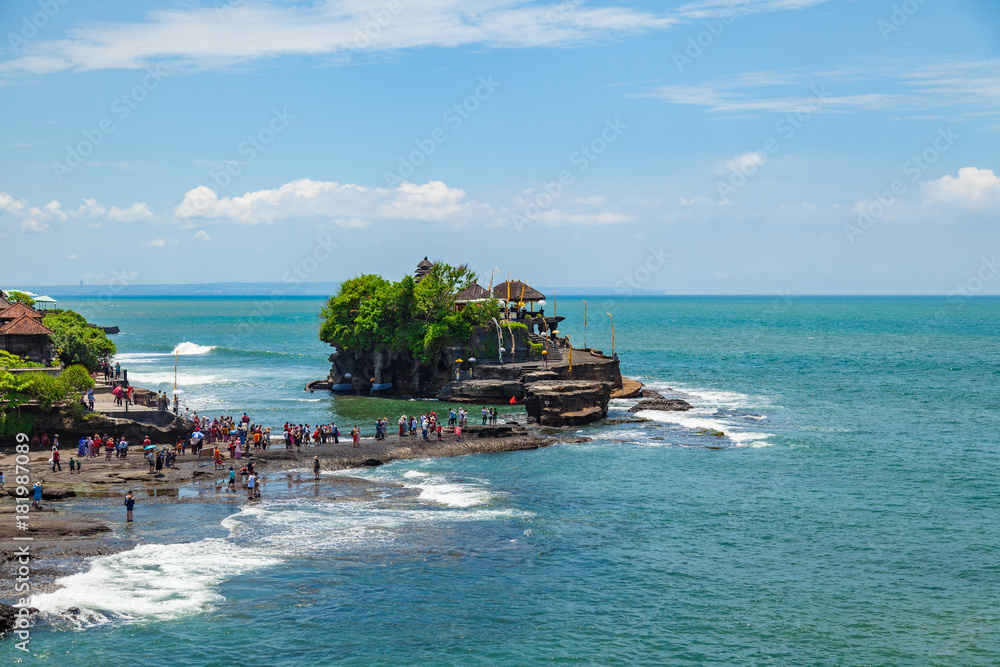 Tourists visited Tanah Lot water temple, one of the famous landscape in Bali, Indonesia Tourists visited Tanah Lot water temple, one of the famous landscape in Bali, Indonesia