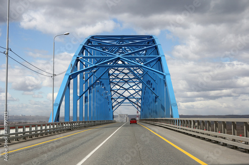 Fototapeta Naklejka Na Ścianę i Meble -  Blue steel bridge across the Yenisei River