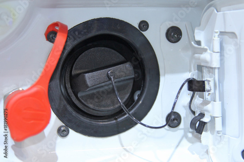 Open hatch of the car gas tank. photo