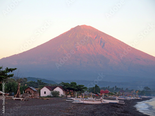 Bali  mountain and fishing boats on the shore