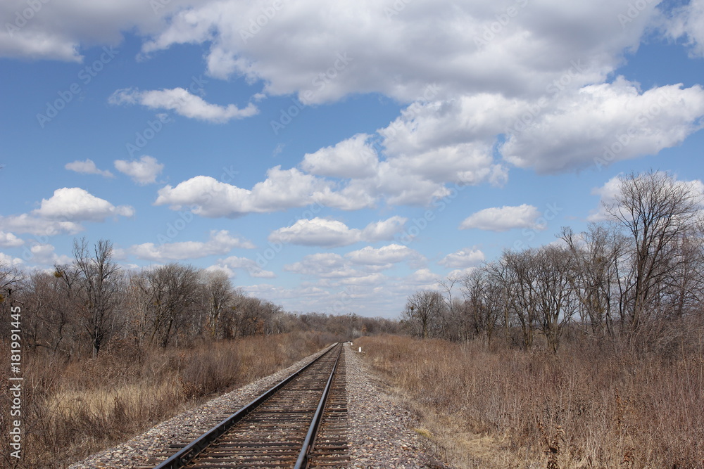 Railway to horizon and clouds on the sky background. Railway to horizon and clouds on the sky background.