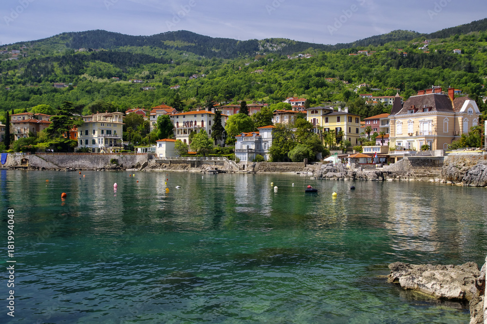 The landscape of the coastline built by the old historical town of Lovran, Lovran is situated on the western coast of the Kvarner Bay, Croatia