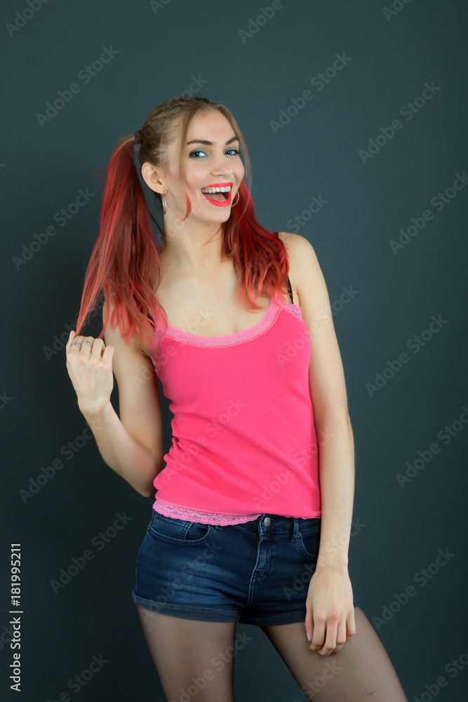 girl with long red and shiny wavy hair . Beautiful model with curly hairstyle . girl with long red and shiny wavy hair . Beautiful model with curly hairstyle .