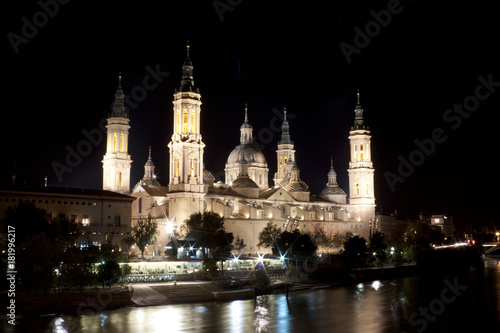 El Pilar cathedral with trees and the river, Zaragoza, Spain