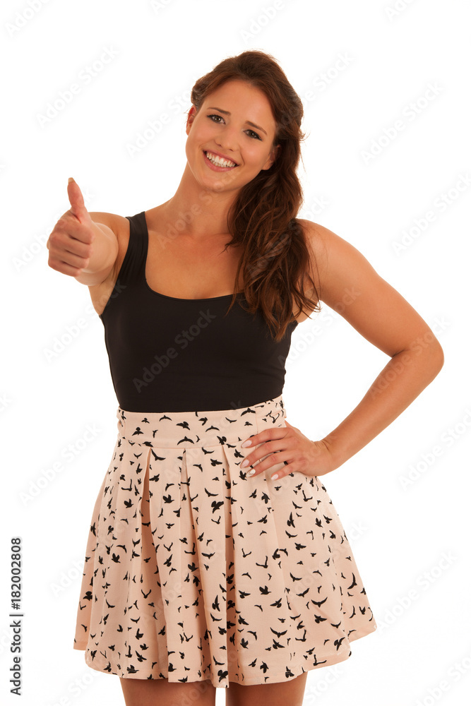 Beautiful young brunette woman gesturing success with thumb up isolated over white background Beautiful young brunette woman gesturing success with thumb up isolated over white background