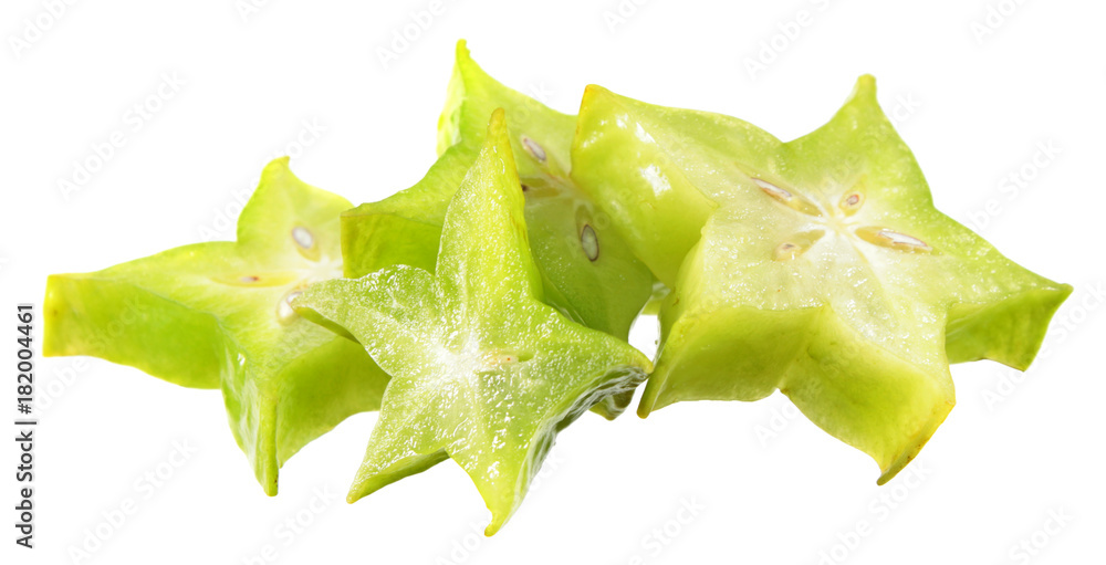 Fototapeta premium Slices of unripe green carambola or starfruit isolated on white background