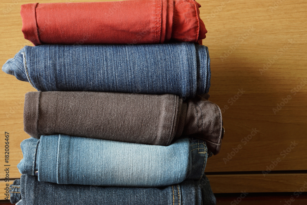     Stack of Multicolor Jeans texture and background