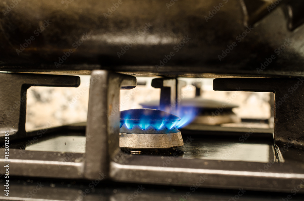 Fotografie Iron pot on burning stove