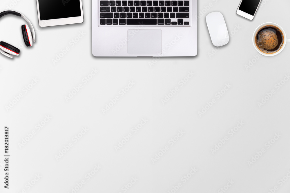 Modern workspace with laptop tablet, smartphone and coffee cup copy space on wood background. Top view. Flat lay style.