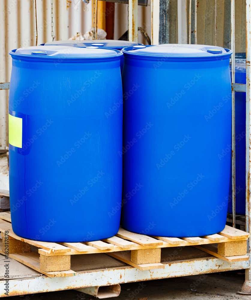 Photography Two blue scratched barrels