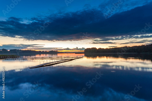 Wonderful blue sunset at the lake in summer