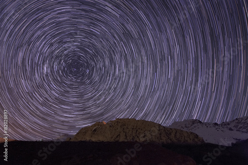 star trails over mountains