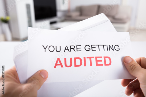 Person Holding You Are Getting Audited Notice