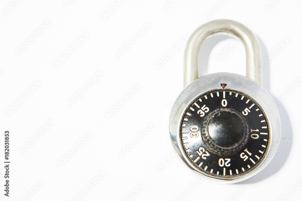 a combination padlock on a white background. with copy space for your text a combination padlock on a white background. with copy space for your text