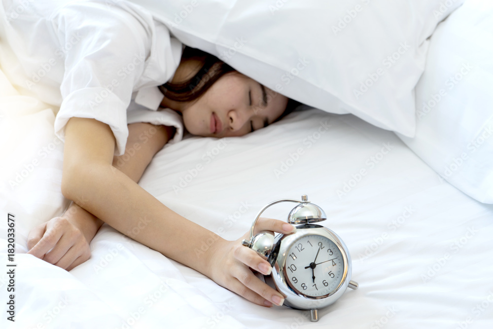 Young woman in white shirt hard to getup Young woman in white shirt hard to getup
