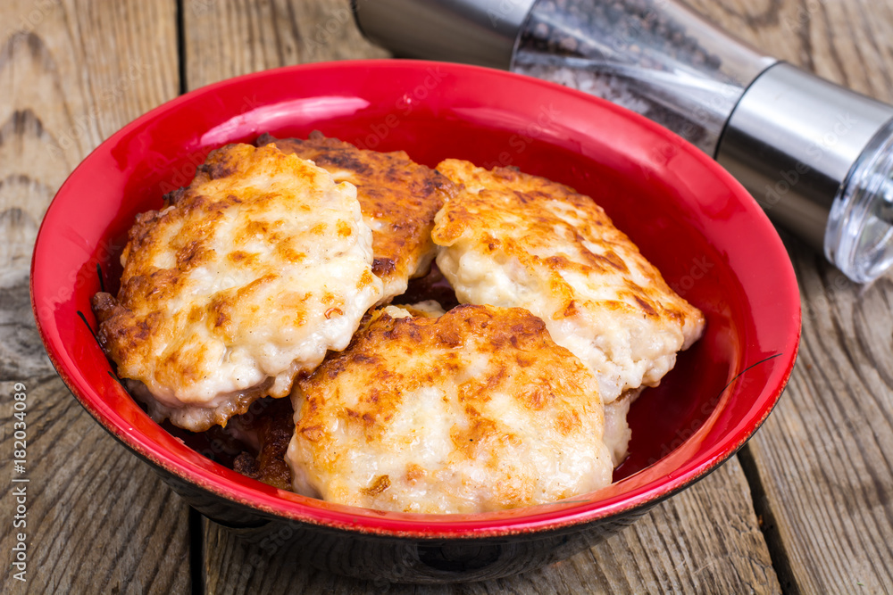 Homemade cutlets in bowl Homemade cutlets in bowl
