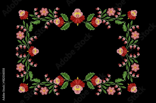 Embroidered frame satin stitch for tablecloth of garlands with stylized flowers and berries on black background